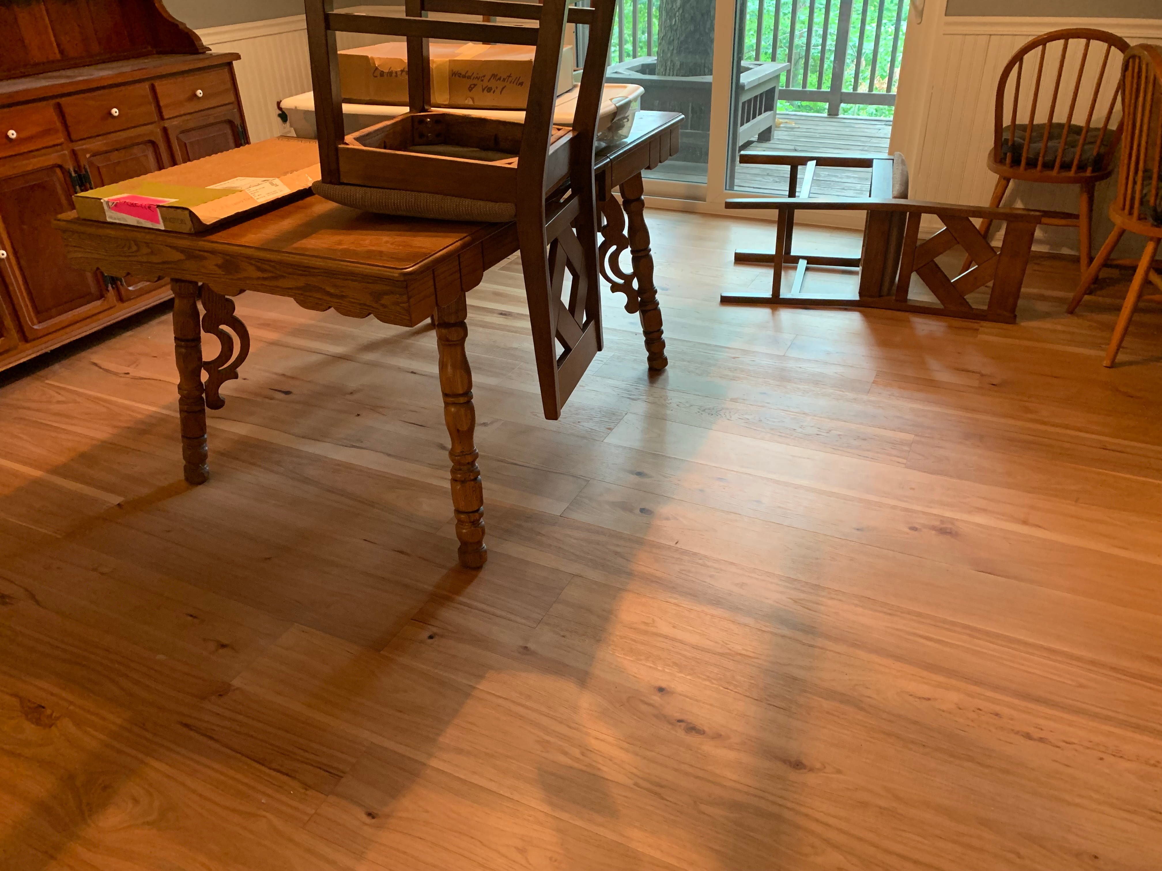 Natural hardwood flooring in dining room