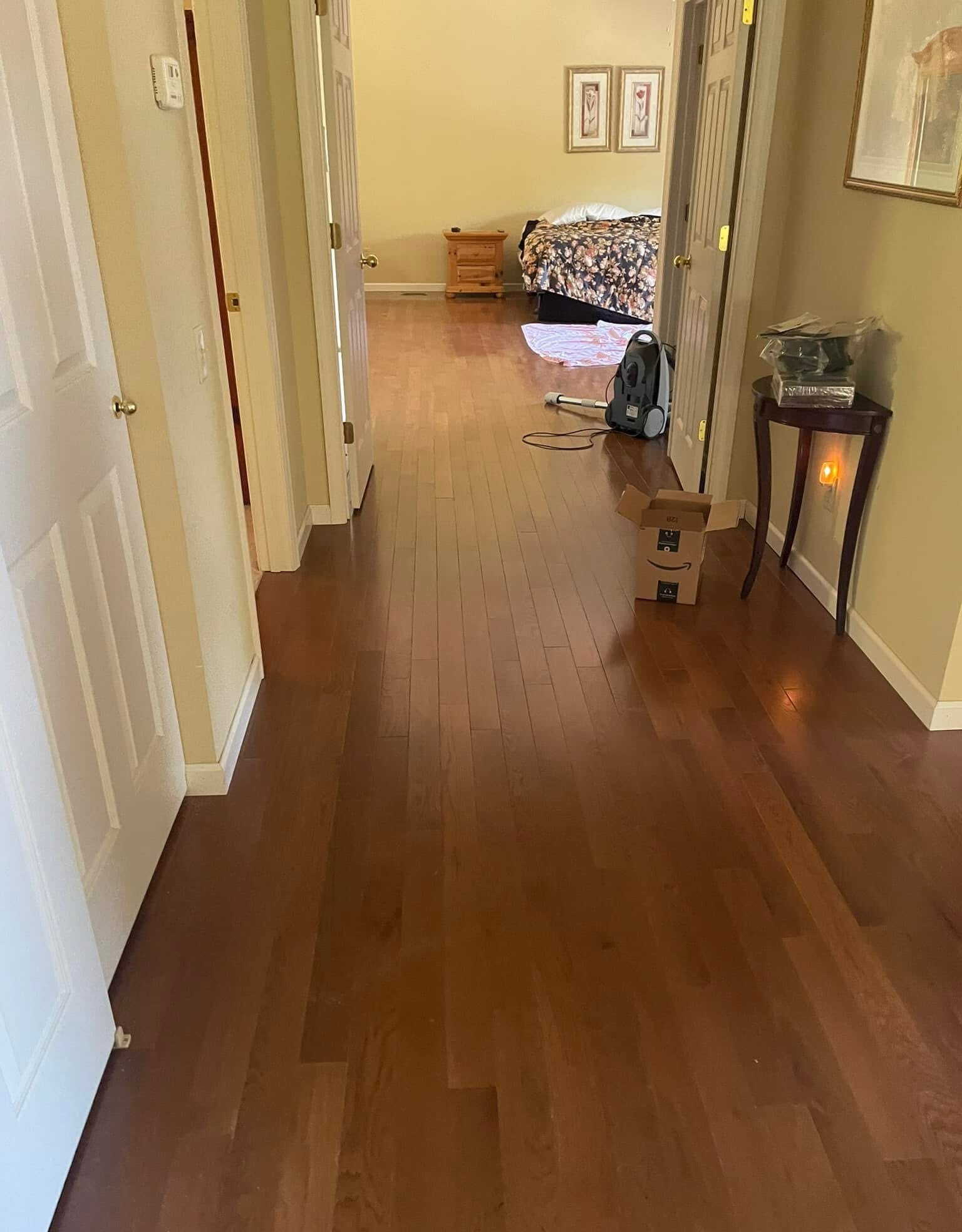 Hardwood flooring through hallway to bedroom