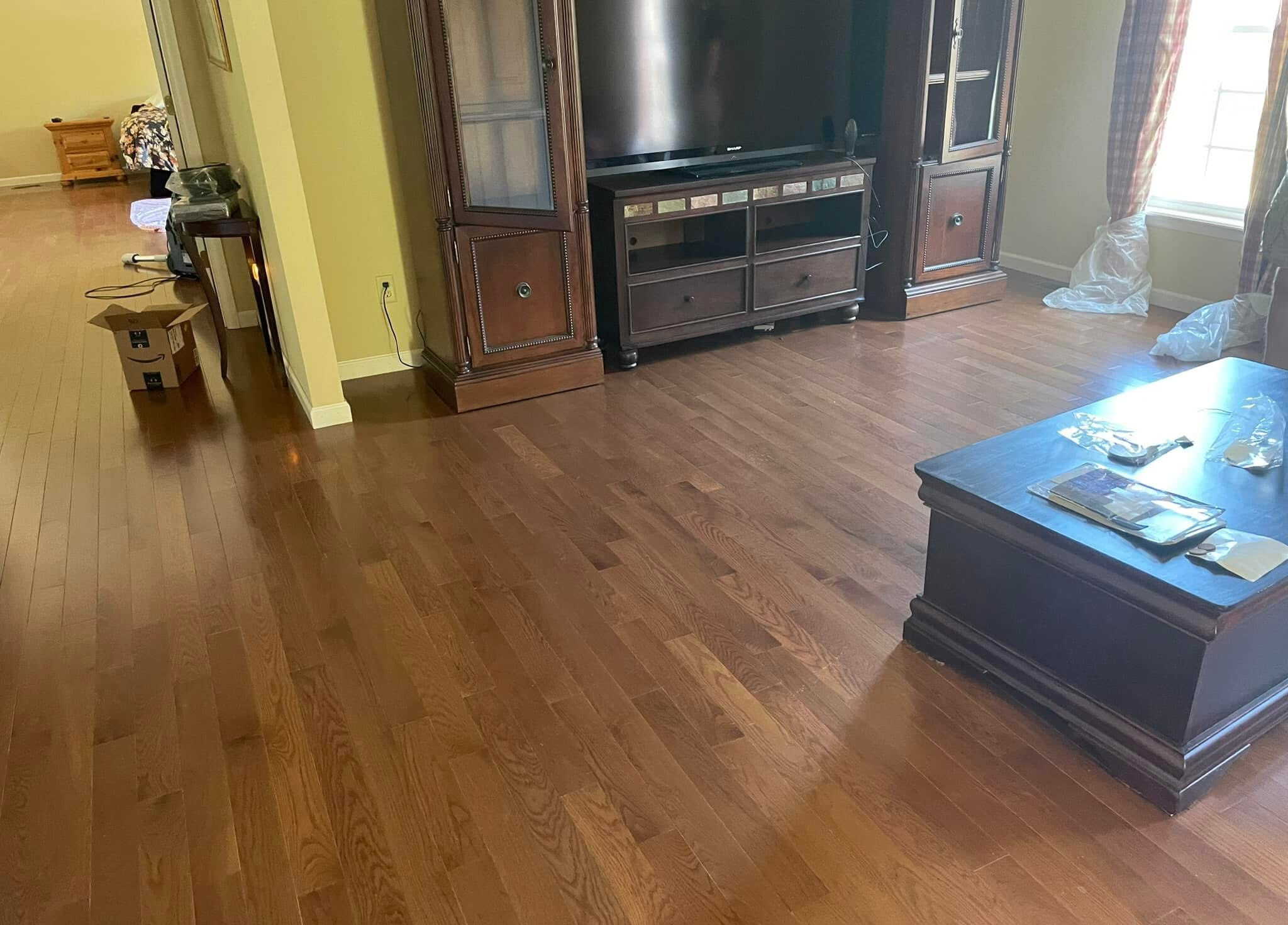 Hardwood flooring in living room with furniture