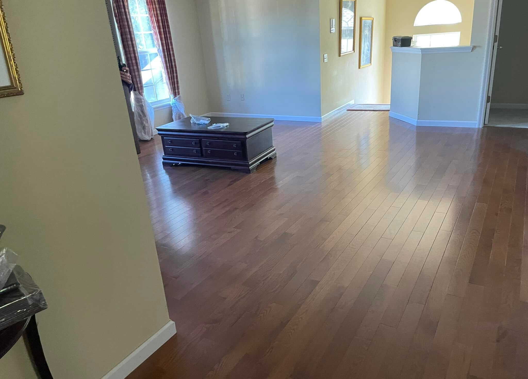 Hardwood flooring throughout living and dining area