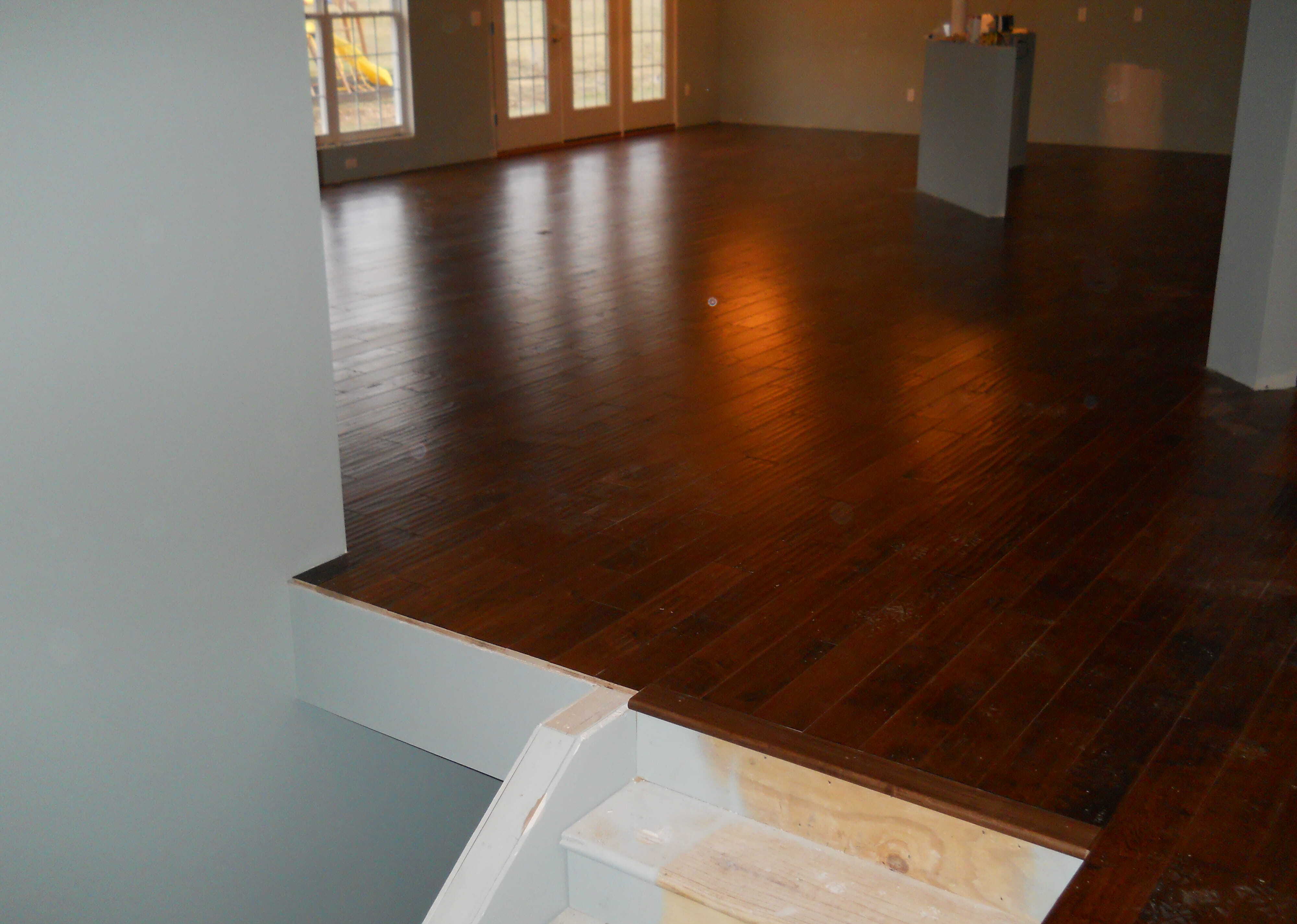 Dark hardwood flooring open plan installation
