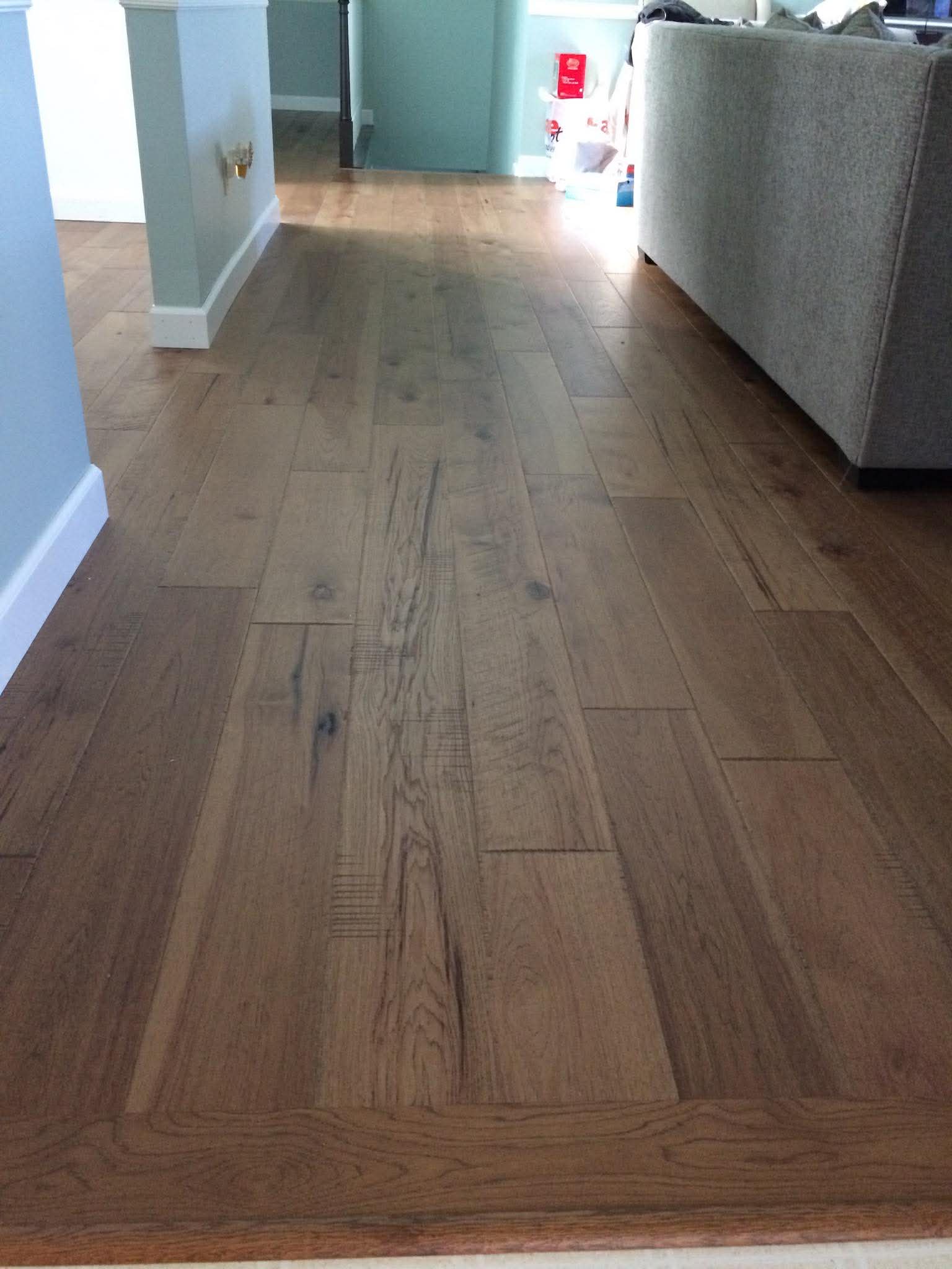 Wide plank hardwood with character grain in living room