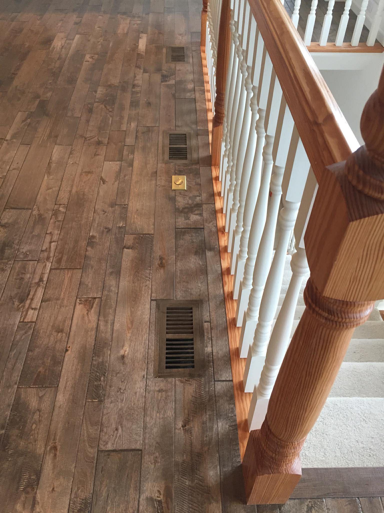 Hardwood flooring detail at staircase landing