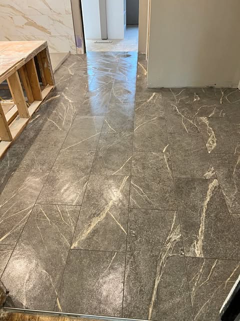Natural stone-look tile floor installation