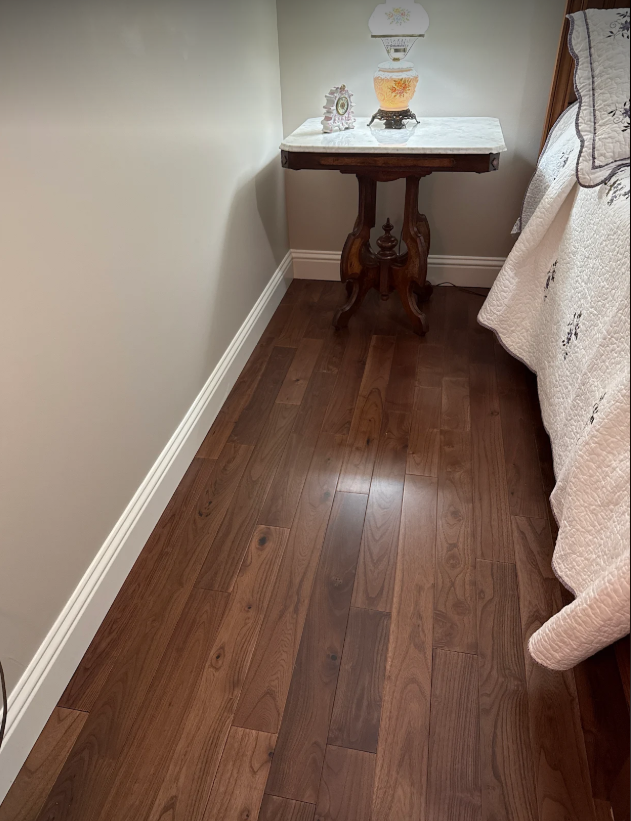Paramount Classic Black Locust Walnut hardwood flooring in bedroom corner