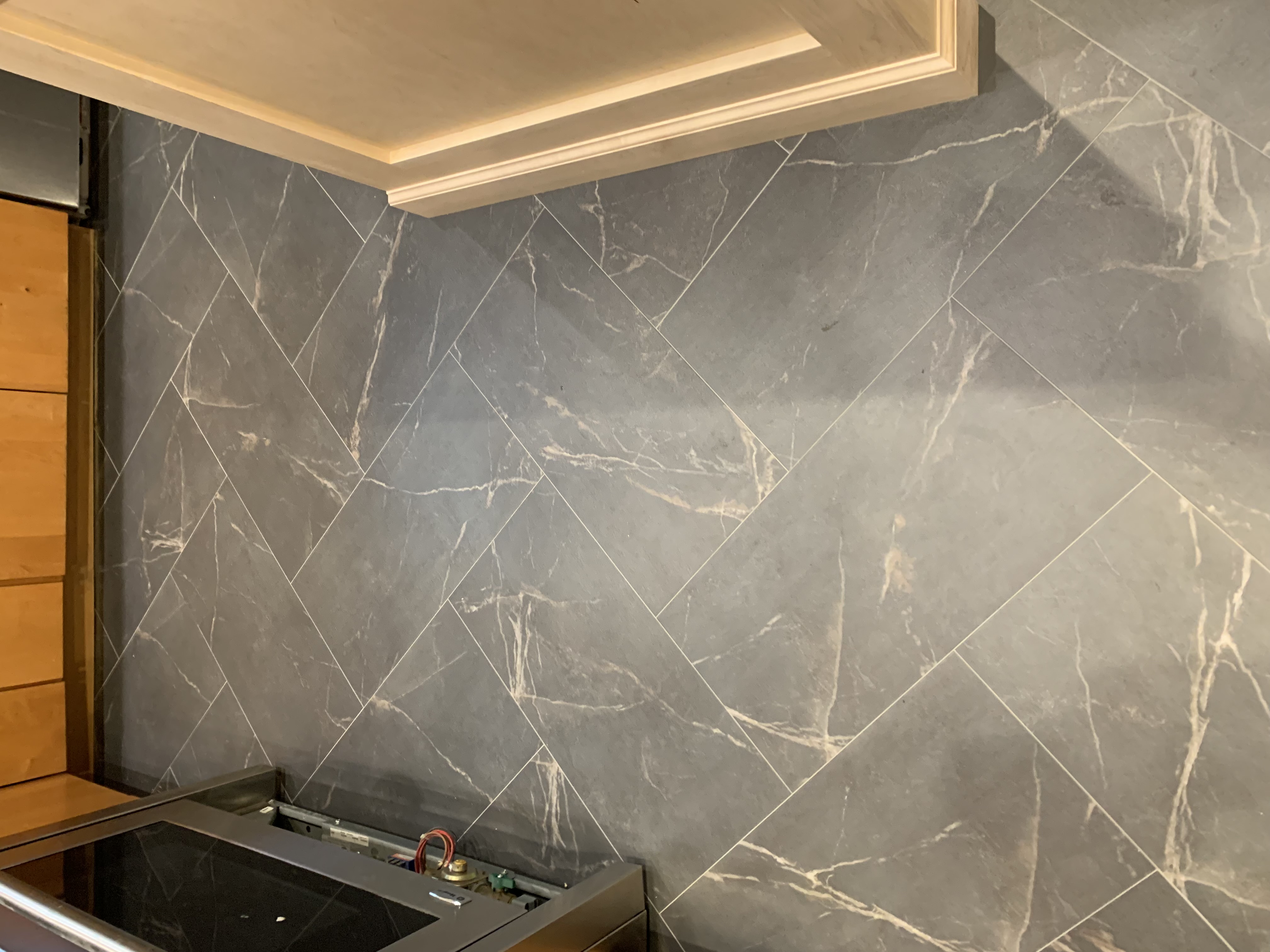 Mannington ADURA Flex Baltic Stone Storm luxury vinyl tile in herringbone pattern in a St. Louis kitchen