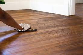 Hardwood floor before refinishing by Kelly's Flooring