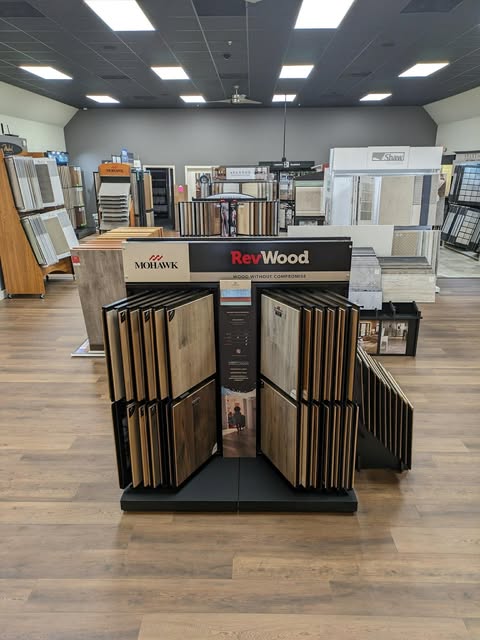 Kelly's Flooring showroom featuring Mohawk RevWood displays